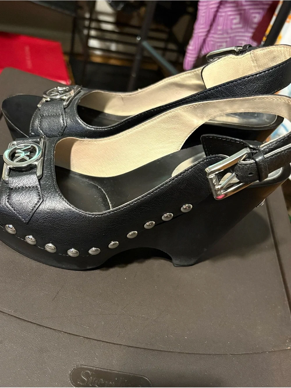MICHAEL Michael Kors Black Leather Studded Wedge Sandals with Silver MK Logo
